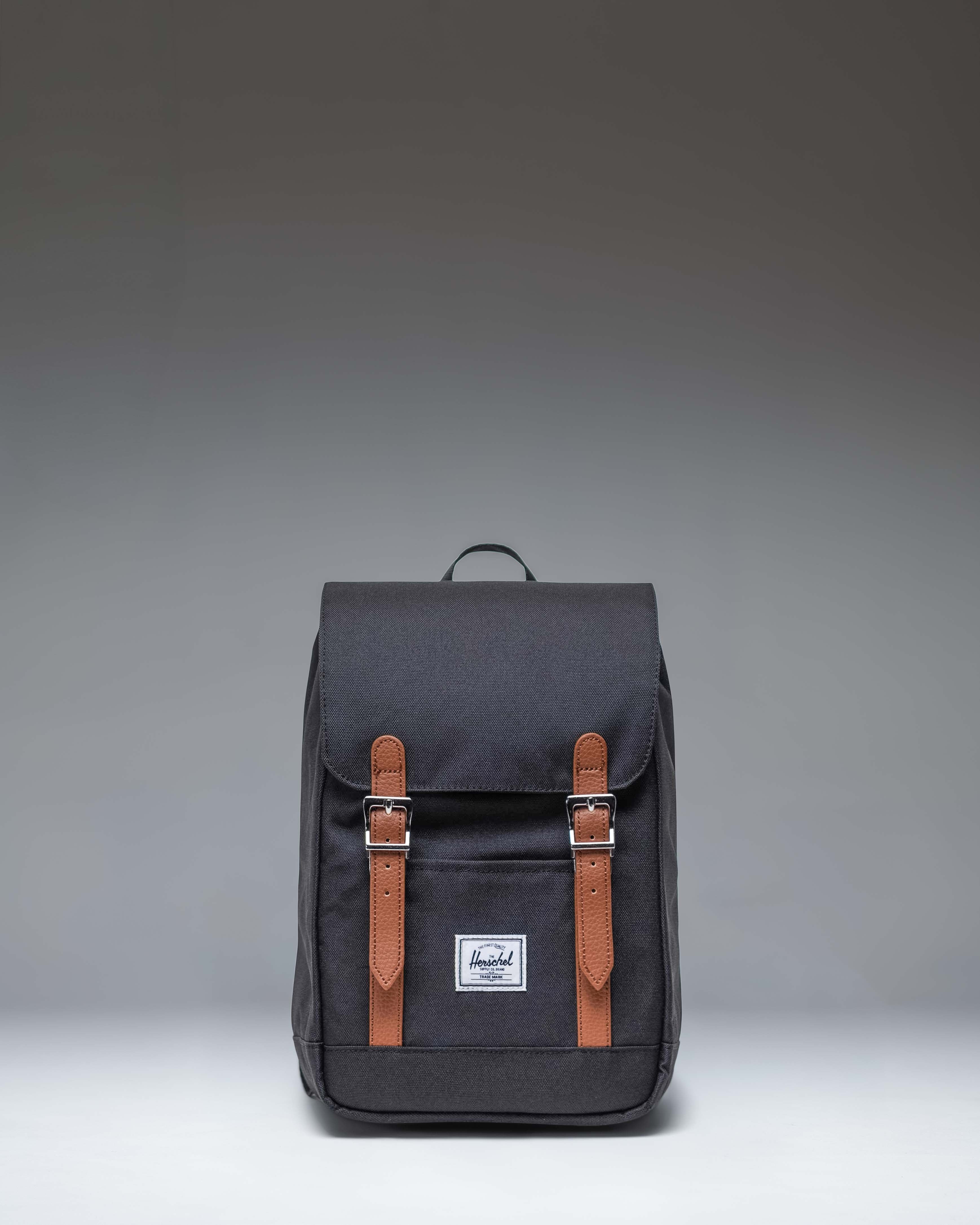 herschel backpack retreat sale | Mini The magnetic closure straps allow for quick access to the front pockets without compromising security Retreat Backpack Small - Huckleberry