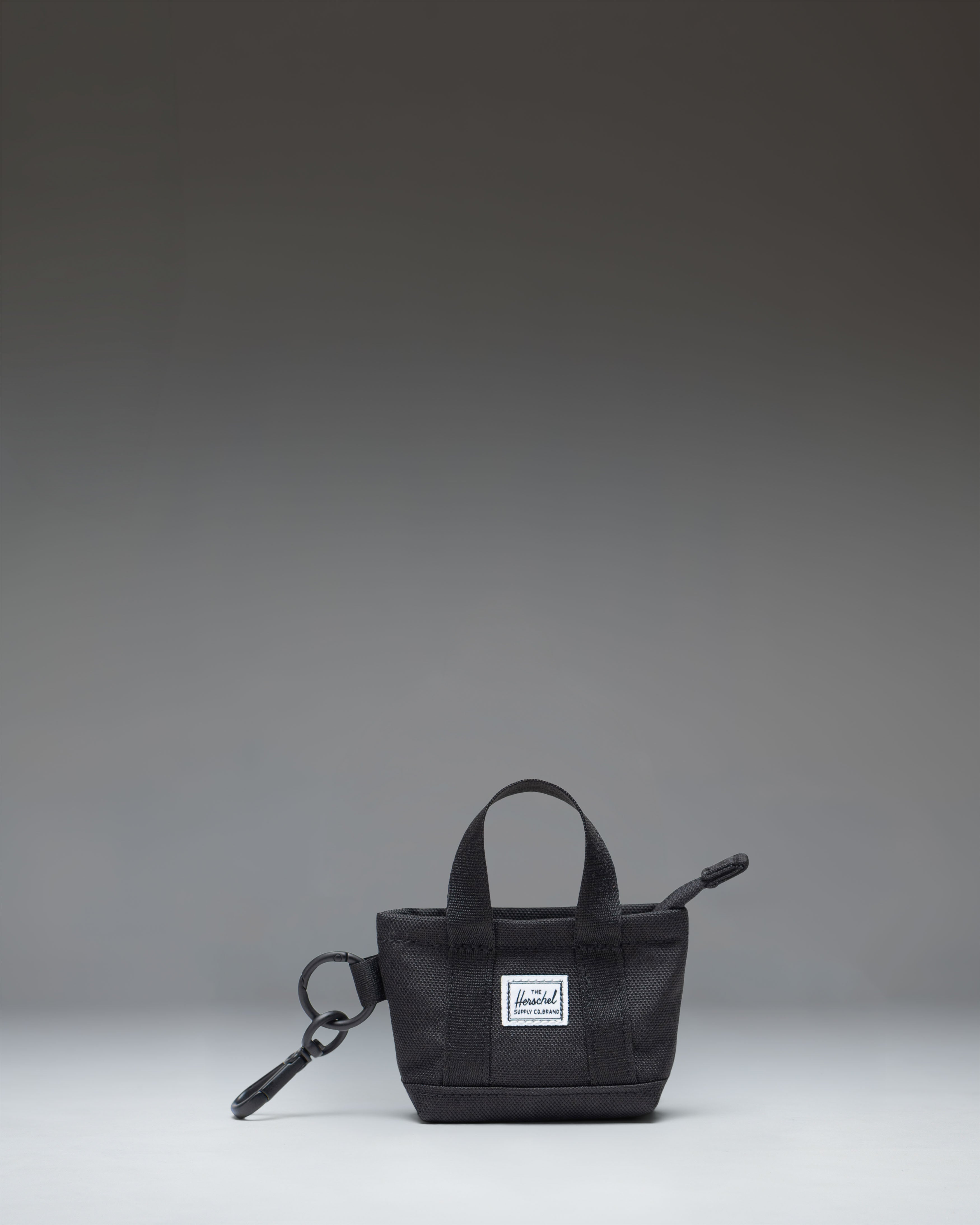 バッグ GLADHAND HERITAGE MONOGRAM TOTE BAG Herschel Heritage Tote Bag Charm – Herschel Supply Co. USA