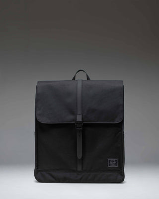 Black Herschel Supply Co. City Backpack shown from the front, highlighting its minimalist design, single strap closure, and clean aesthetic.