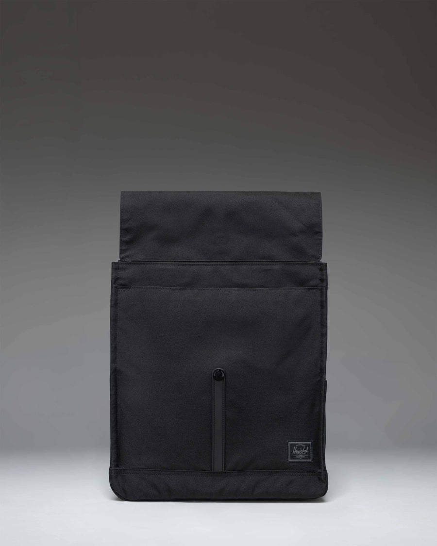 Herschel Supply Co. City Backpack in Black Tonal, showcasing its slim, scout-styled design with a single strap closure.