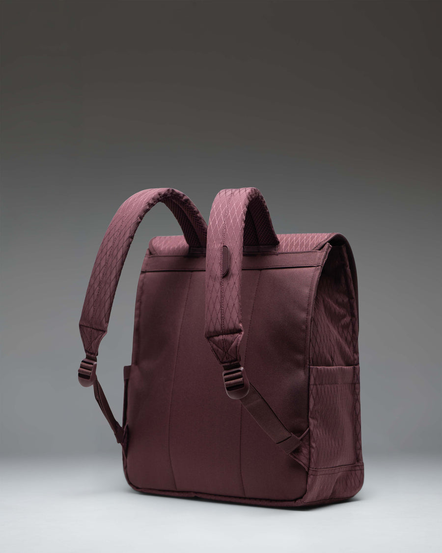 Herschel Supply Co. City Backpack in Huckleberry Diamond with a single front magnetic strap closure and clean, slim design.