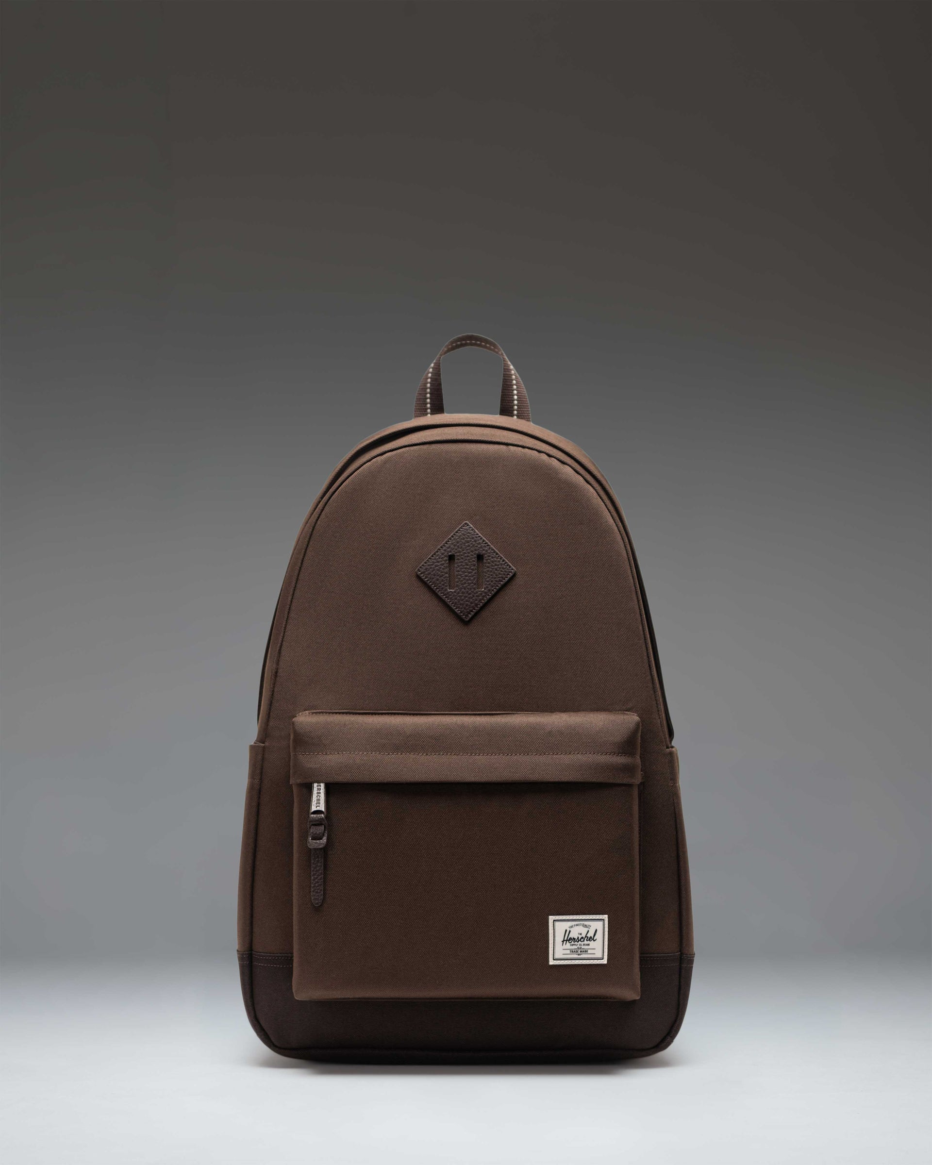 grey and brown herschel backpack SUPPLY - Accessories - Heritage With a zipper closure and adjustable strap Survey Backpack