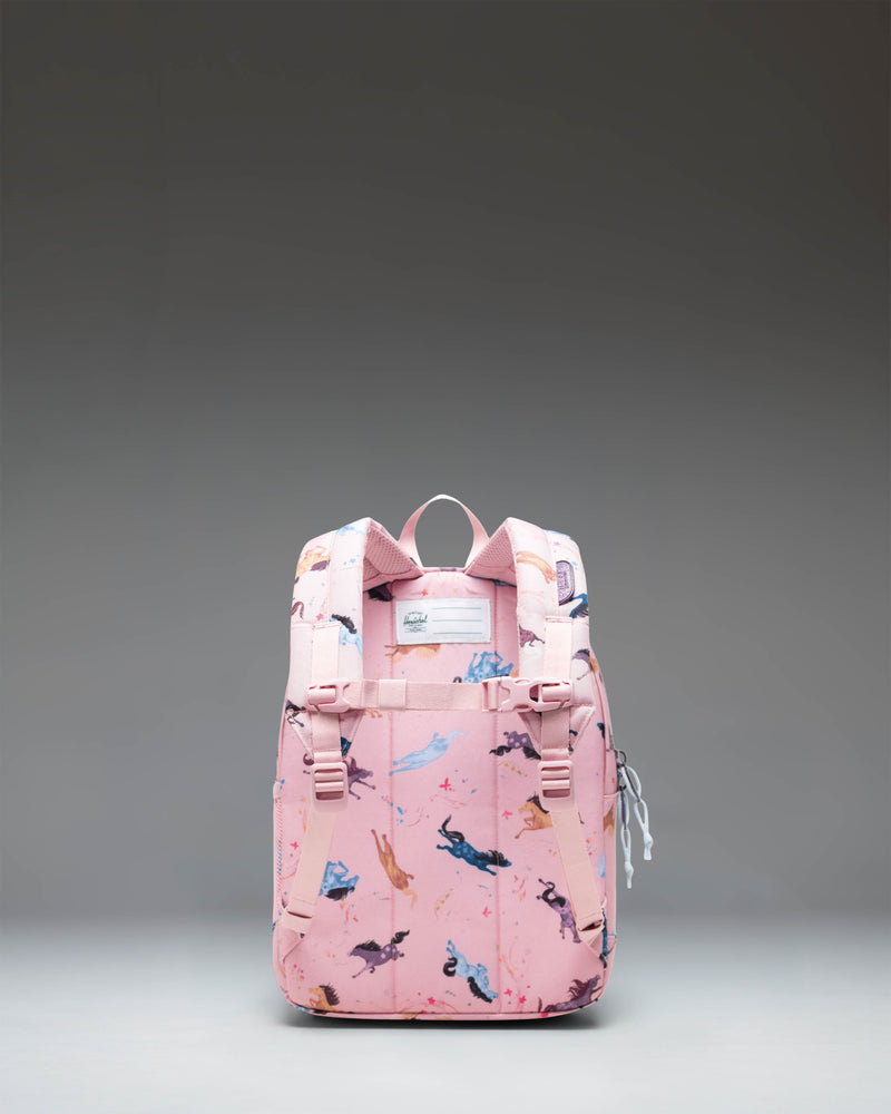 Herschel Heritage Kids Backpack in the Wild Horses pattern, featuring a brown and white horse print with a black diamond accent.