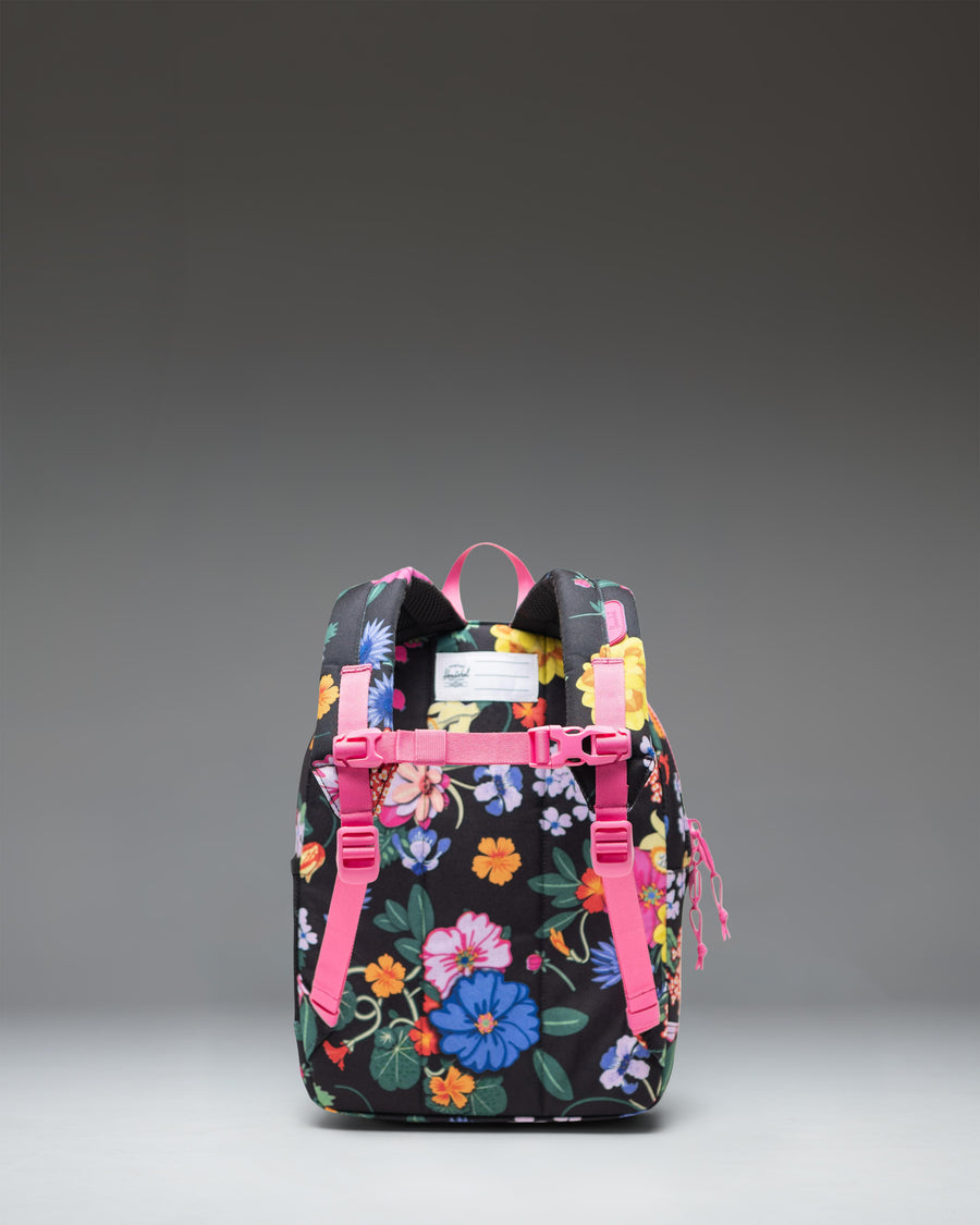 Herschel Heritage Kids Backpack in Paper Garden floral pattern, featuring a front pocket and classic diamond accent.
