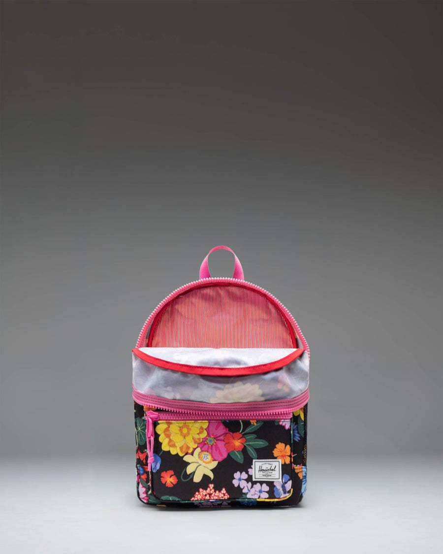 Herschel Heritage Kids Backpack in Paper Garden pattern, featuring a black background with colorful floral accents.