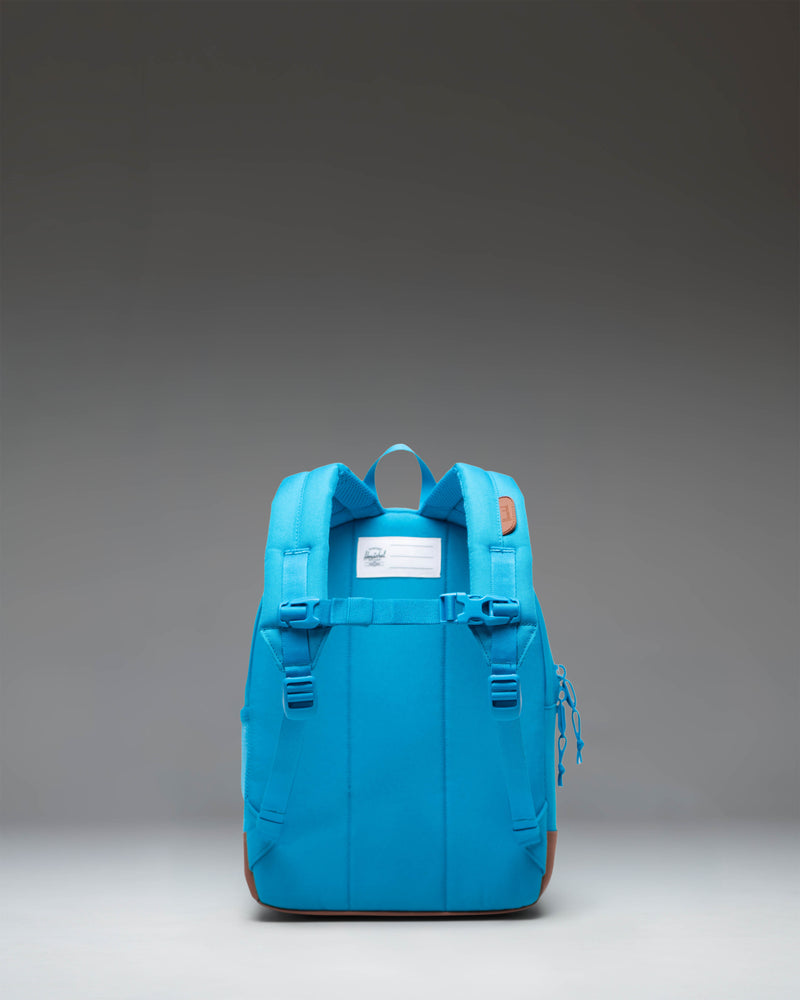 Herschel Heritage Kids Backpack in Hawaiian Surf turquoise and saddle brown, featuring padded shoulder straps and a front storage pocket.