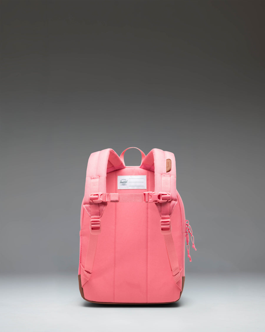 Herschel Heritage Kids Backpack in Confetti/Saddle Brown featuring a colorful confetti pattern with a light brown diamond and bottom panel.