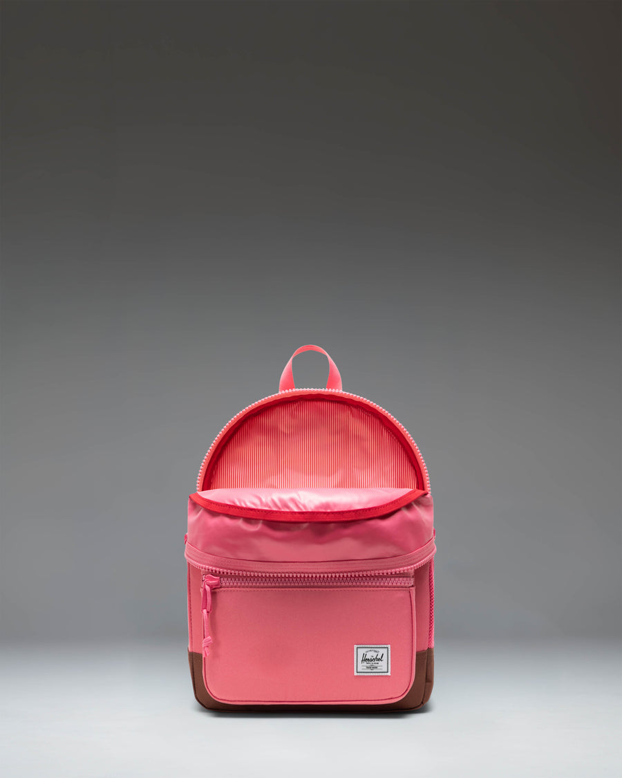 Herschel Heritage Kids Backpack in Confetti/Saddle Brown featuring a colorful speckled pattern and light brown accents.
