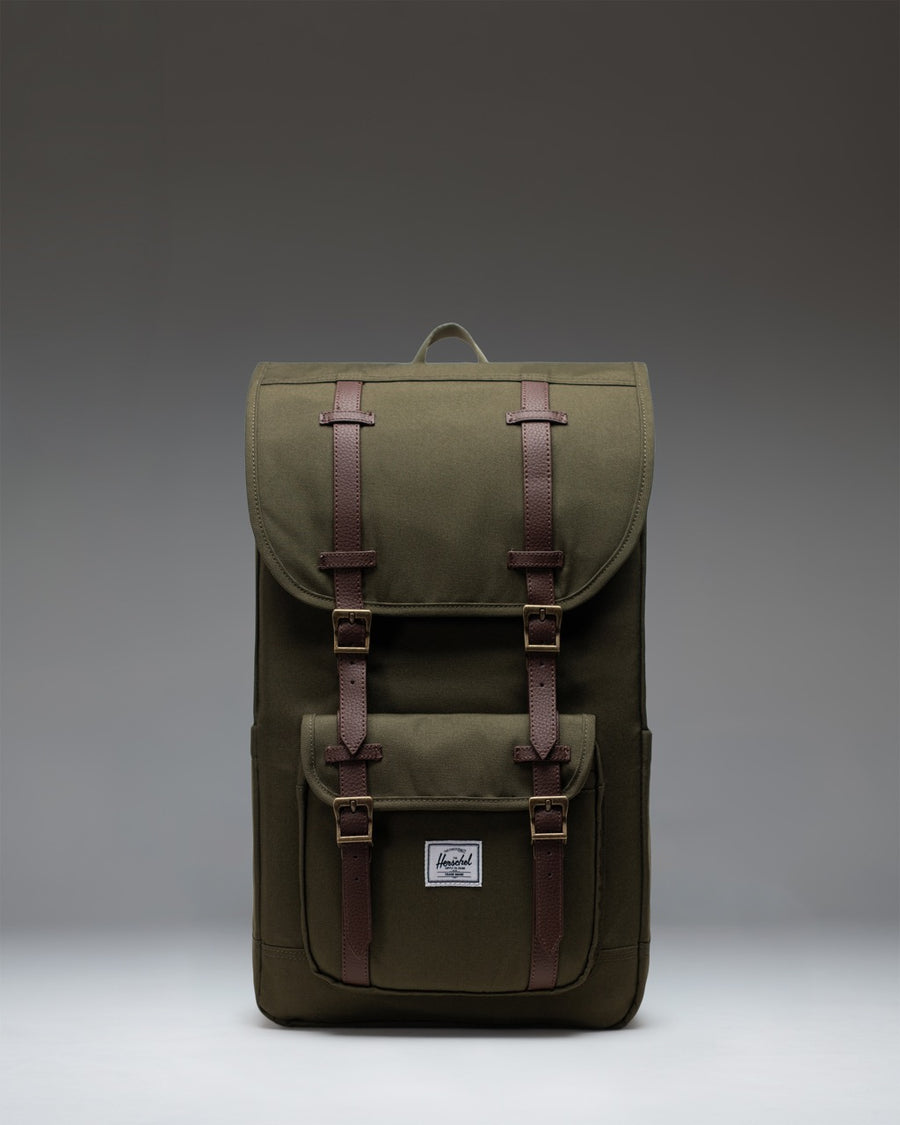 Herschel Little America Backpack in Ivy Green, featuring a classic mountaineering design with dual magnetic strap closures.