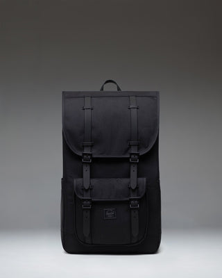 Herschel Little America Backpack in Black Tonal with black straps and front storage pocket.