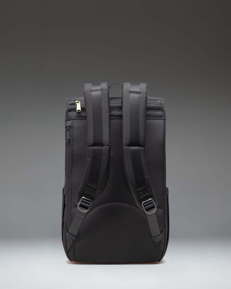 Back view of Herschel Little America Backpack in Patches Black showing padded shoulder straps and mesh back panel.