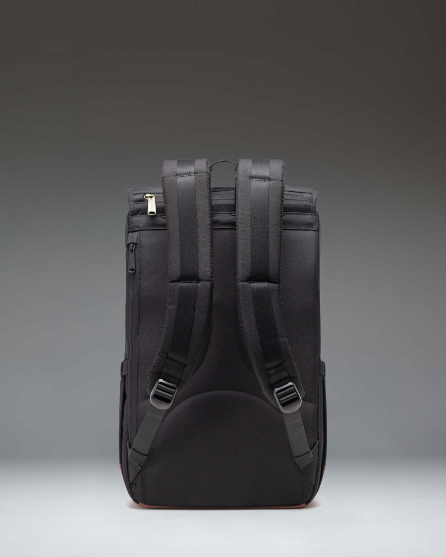 Back view of Herschel Little America Backpack in Patches Black showing padded shoulder straps and mesh back panel.