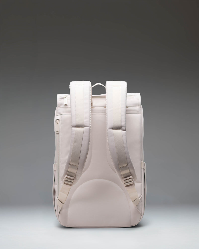 Herschel Little America Mid Backpack in Moonbeam, a neutral light beige everyday bag with rubber strap closures.