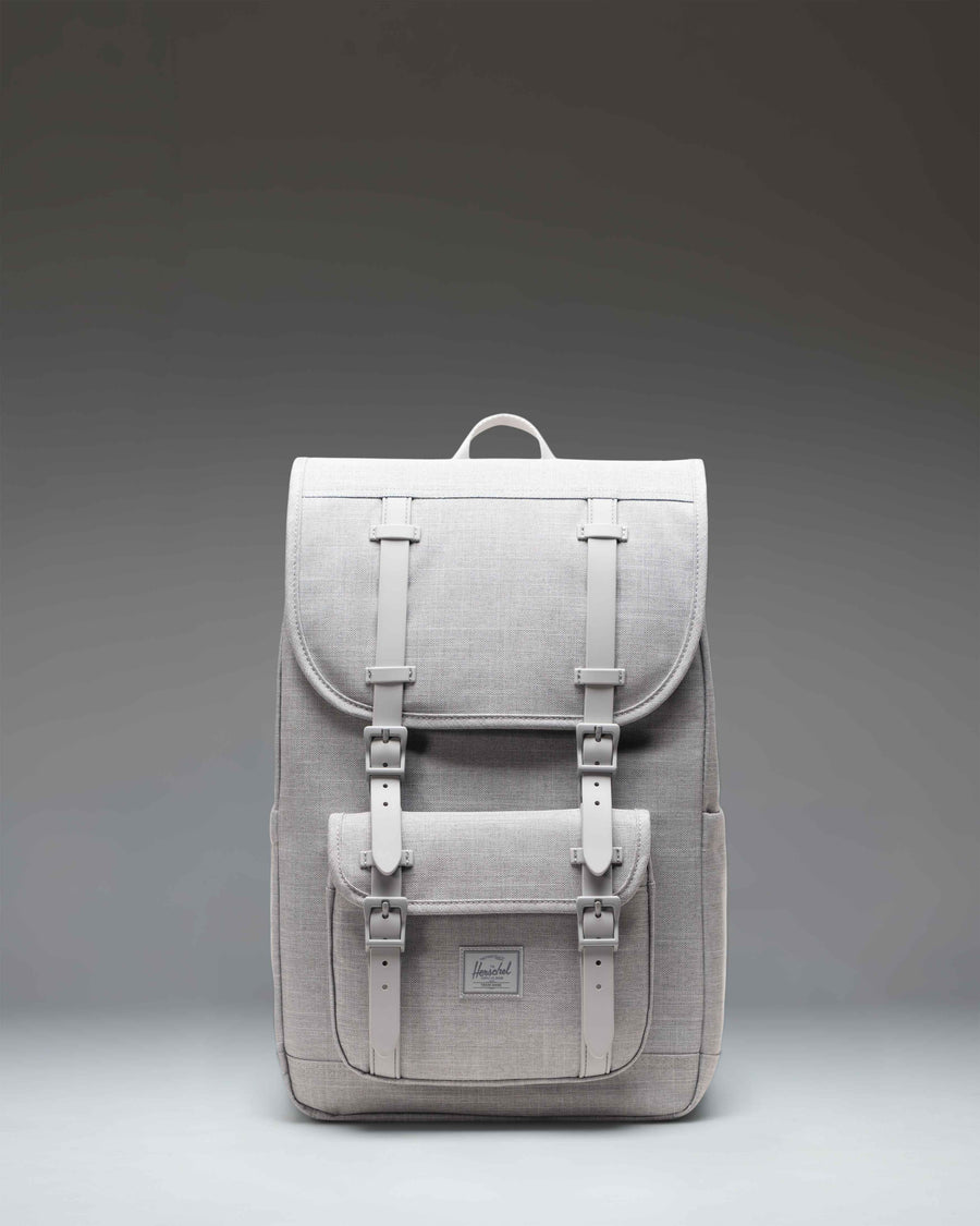 Herschel Little America Mid Backpack in Grey Crosshatch, featuring a front view with black rubber straps and a classic woven label.