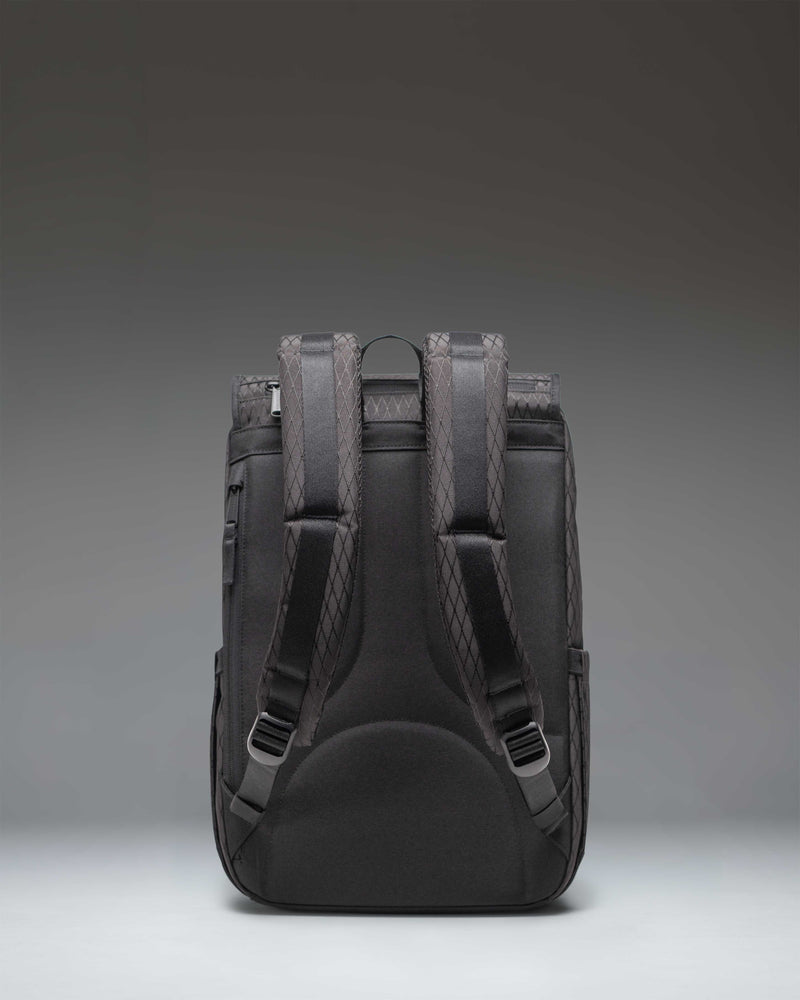 Herschel Little America Mid Backpack in Black Diamond/Black featuring a monochromatic textured diamond-pattern weave and classic strap closures.