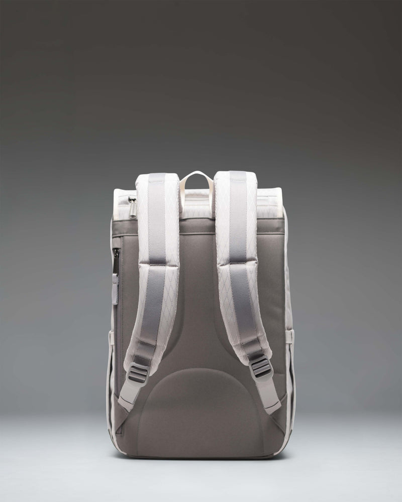 Herschel Little America Mid Backpack in Vapor Diamond and Charcoal Gray with dual rubber straps and a front storage pocket.