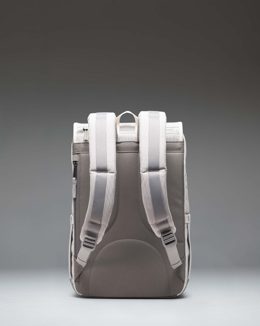 Herschel Little America Mid Backpack in Vapor Diamond and Charcoal Gray with dual rubber straps and a front storage pocket.