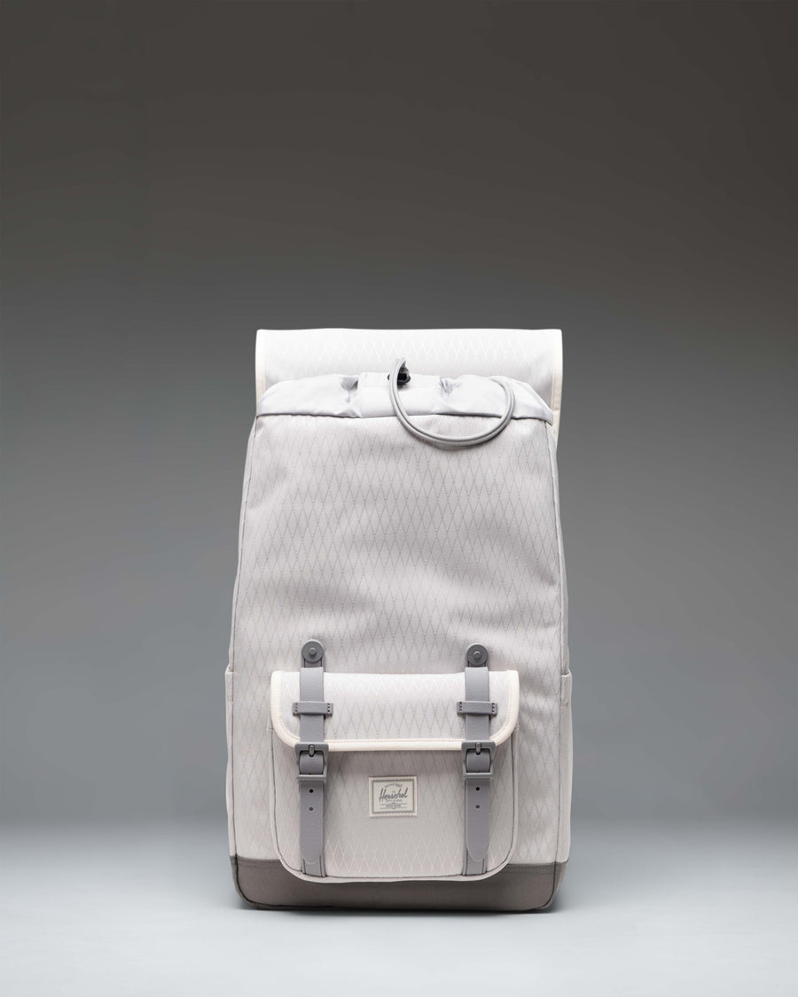 Herschel Little America Mid Backpack in Vapor Diamond pattern with Charcoal Gray accents and rubber straps.