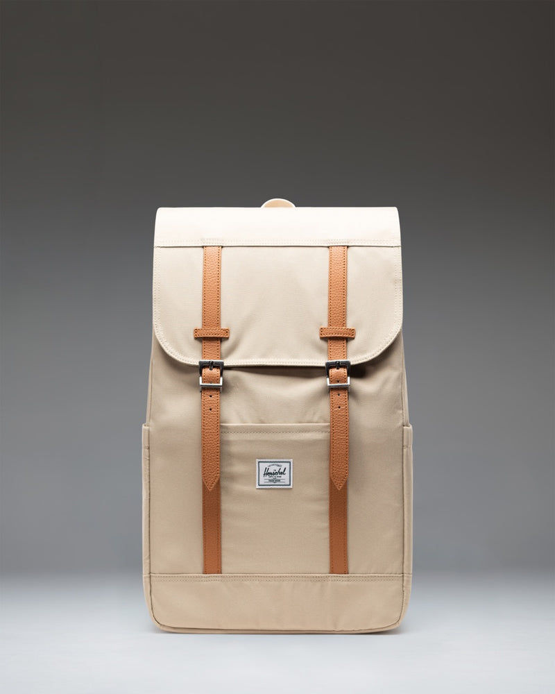 Herschel Retreat Backpack in Eucalyptus green, showing the front view with dual straps and classic logo label.