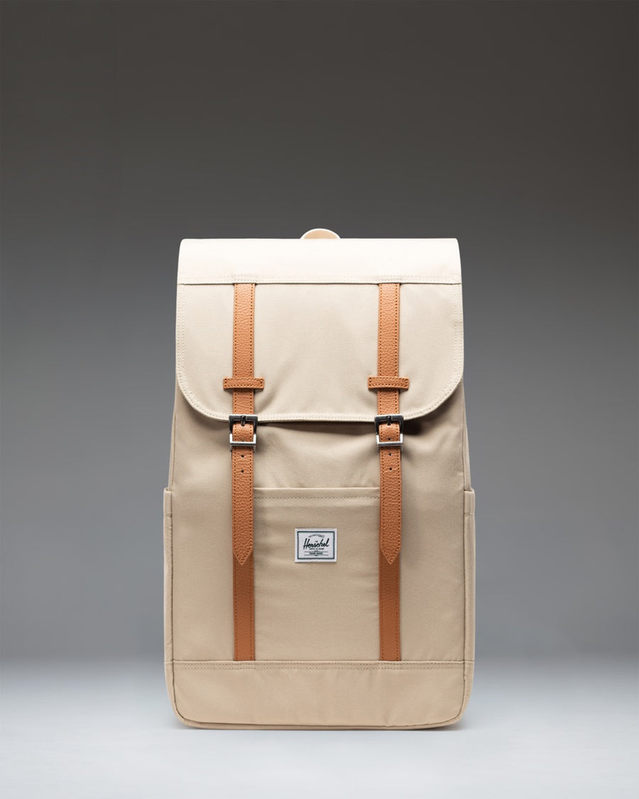 Herschel Retreat Backpack in Eucalyptus green, showing the front view with dual straps and classic logo label.