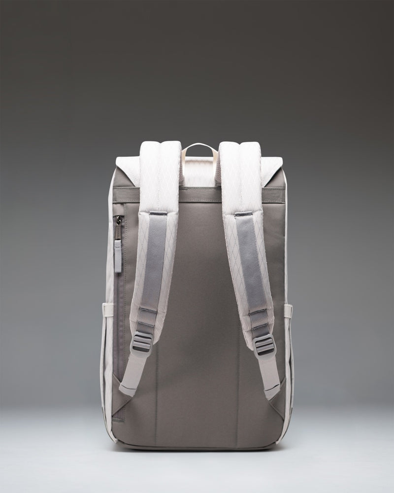 Herschel Retreat Backpack in Vapor Diamond/Charcoal Gray featuring a front slip pocket, magnetic strap closures, and a top carrying handle.