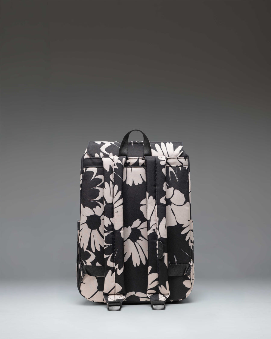 Herschel Retreat Small Backpack in Graphic Daisy - Moonbeam, featuring a floral pattern with signature strap closures.