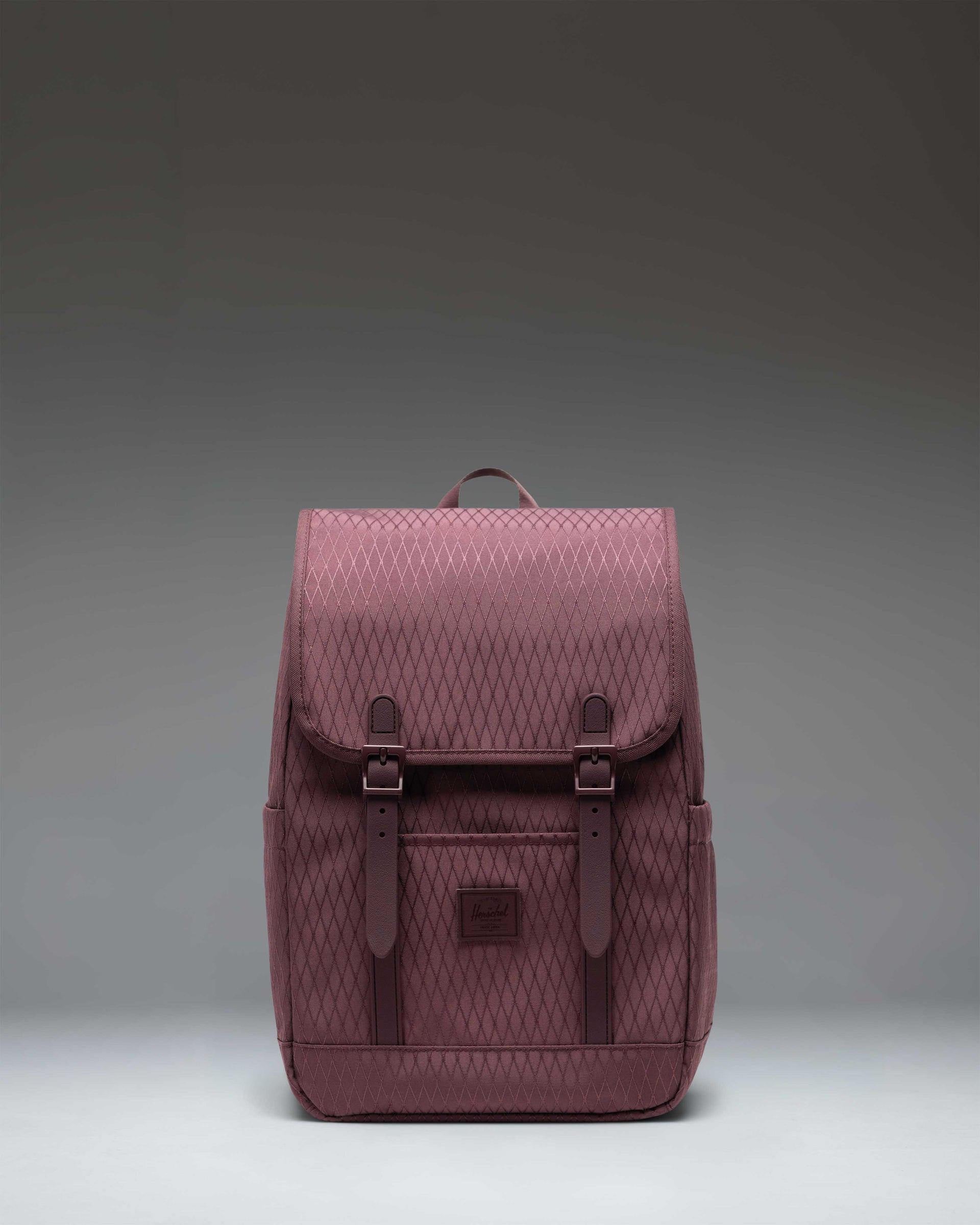 herschel backpack retreat sale | Mini The magnetic closure straps allow for quick access to the front pockets without compromising security Retreat Backpack Small - Huckleberry