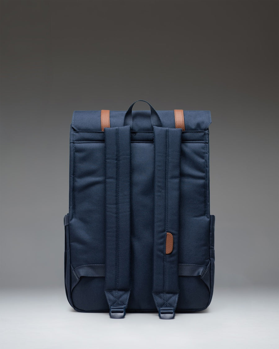 Herschel Survey Backpack in Navy, featuring a clean, modern square silhouette with dual front strap closures.