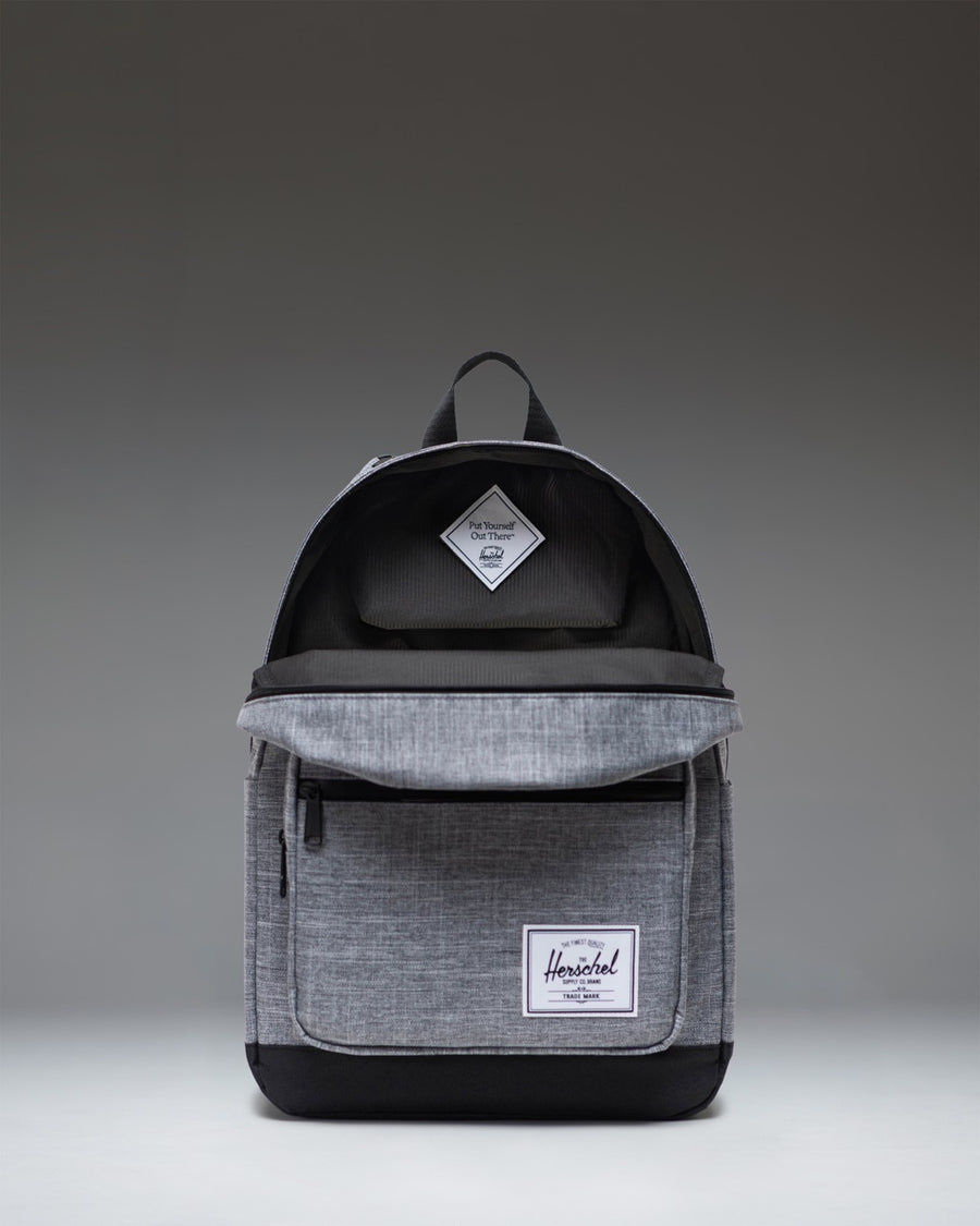 Herschel Supply Co. Pop Quiz Backpack in Raven Crosshatch grey, showing the spacious main compartment with a laptop sleeve.