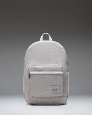 Herschel Supply Co. Pop Quiz Backpack in Grey Crosshatch, showing the front view with a brown zipper detail and a white logo patch.
