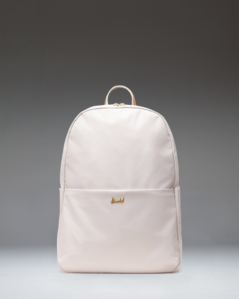 Herschel Supply Co. Beatrix Backpack in Moonbeam, front view showing its clean, minimalist design and light beige color.