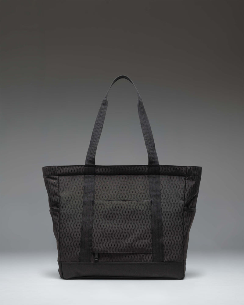 Herschel Heritage Tote in Black Diamond/Black featuring a durable canvas design, dual carrying handles, and the classic woven logo label.