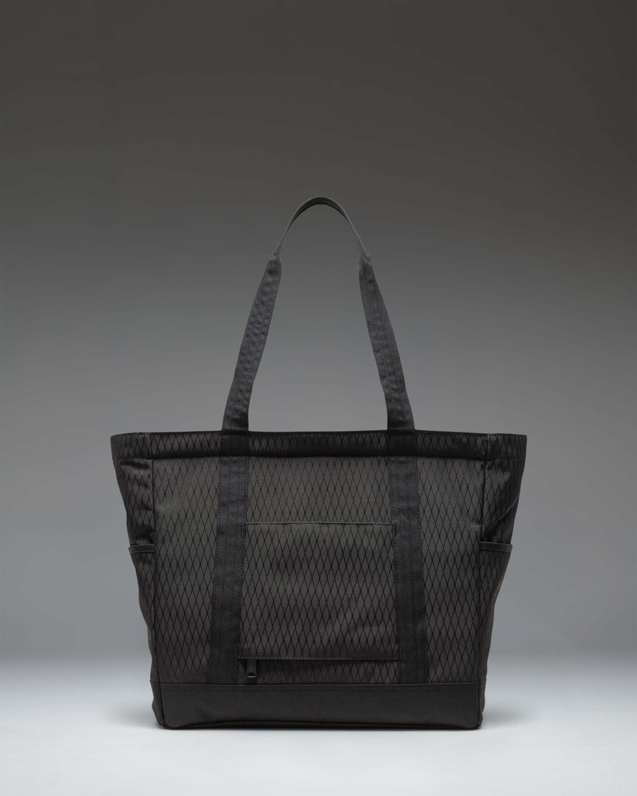 Herschel Heritage Tote in Black Diamond/Black featuring a durable canvas design, dual carrying handles, and the classic woven logo label.