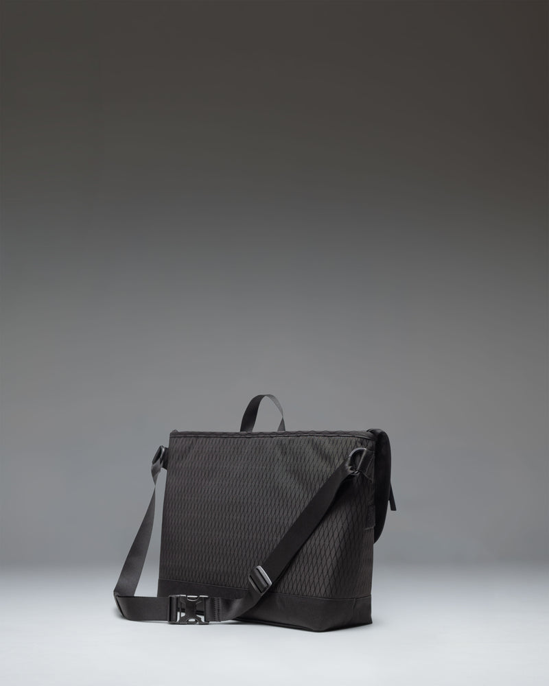 Herschel Supply Co. Cove Messenger bag in Black Diamond/Black.
