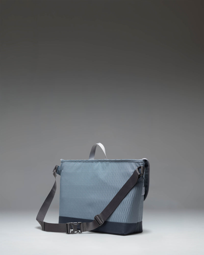 Herschel Supply Co. Cove Messenger bag in Blue Mirage Diamond/Sea Storm.