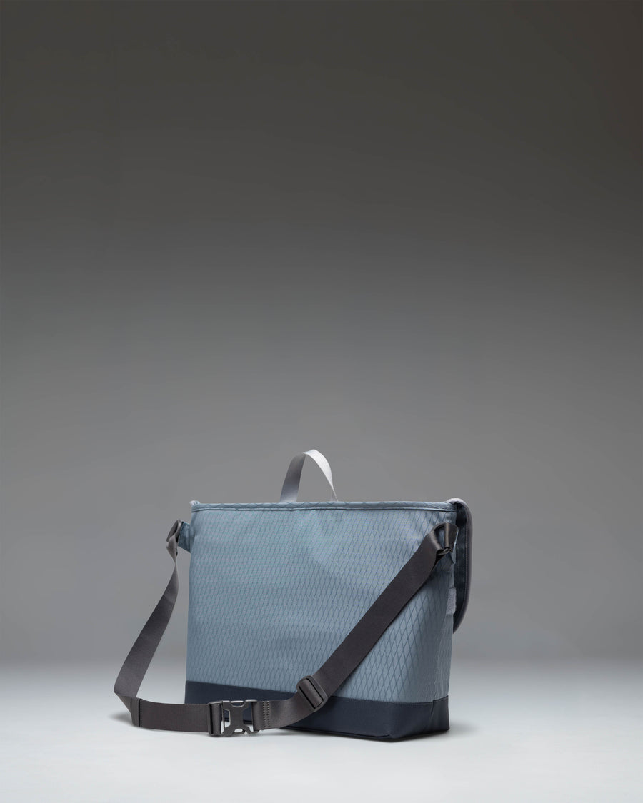 Herschel Supply Co. Cove Messenger bag in Blue Mirage Diamond/Sea Storm.