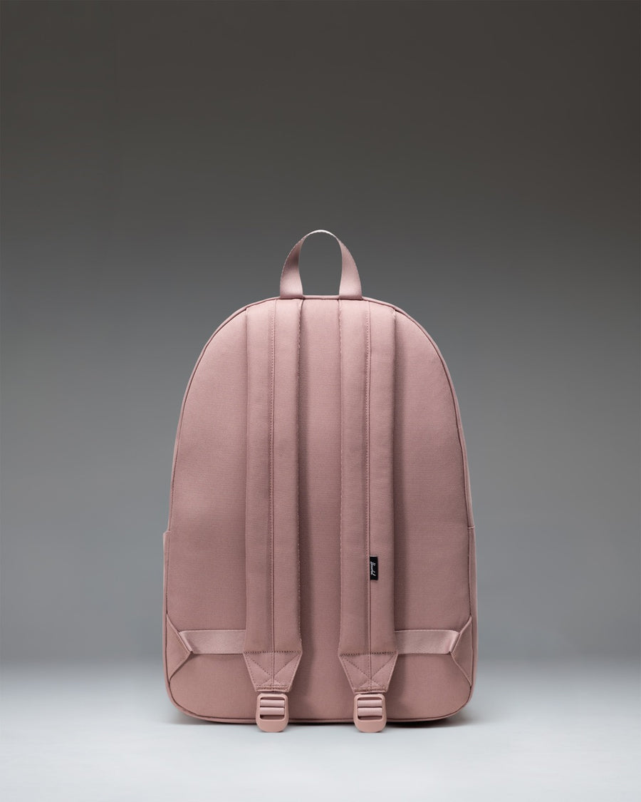 Herschel Supply Co. Classic XL Backpack in Ash Rose, showcasing the front pocket, zipper details, and classic woven label.
