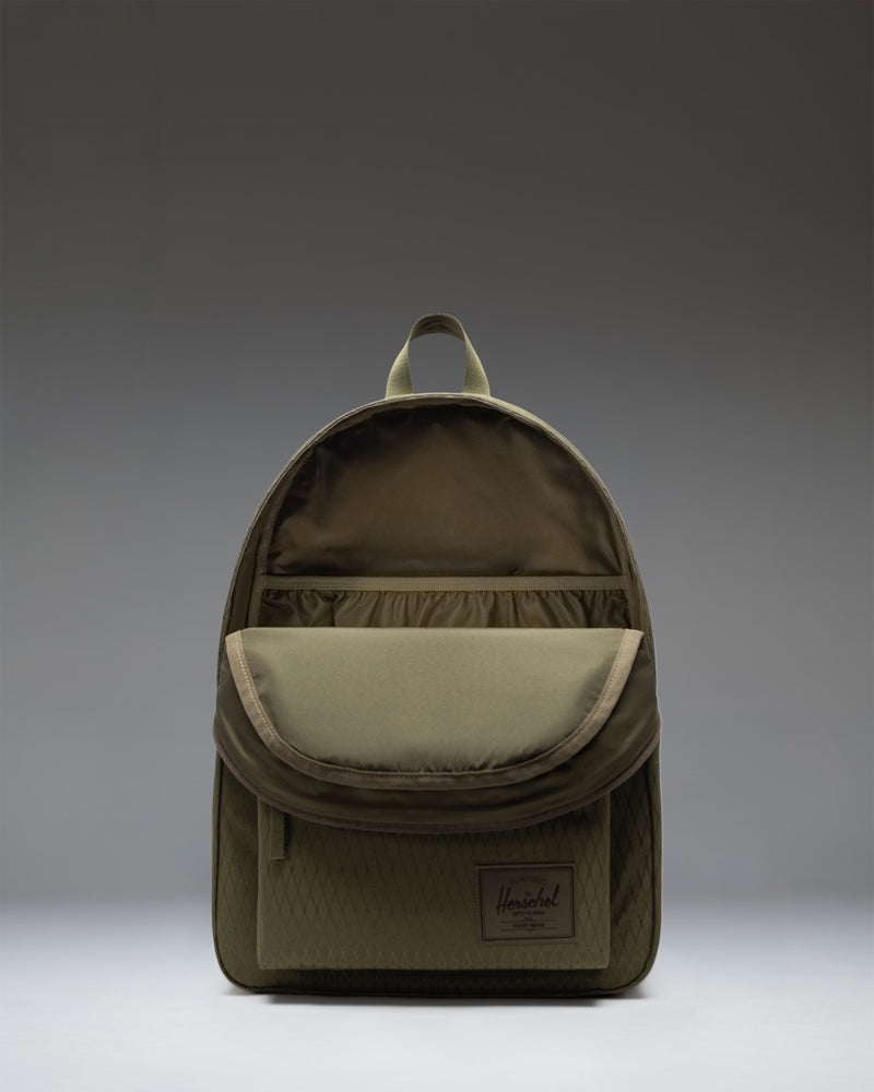 Herschel Supply Co. Classic XL Backpack in Ivy Green Diamond, featuring a solid green color with a subtle diamond texture pattern.