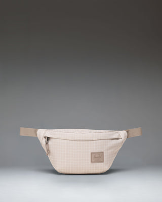 Herschel Classic Hip Pack in Grid Pelican/Roasted Cashew colorway shown from a front angle against a white background.