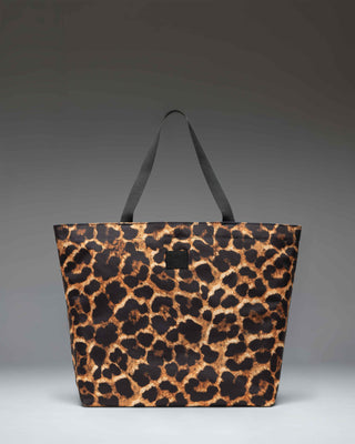 Herschel Supply Co. Classic Tote in Digi Leopard Light print, showcasing a spacious design with carrying handles.