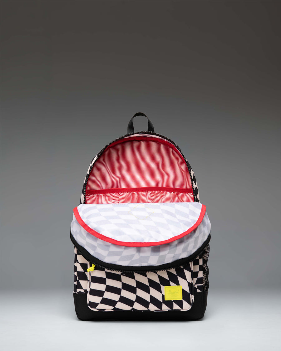 Herschel Heritage Youth Backpack in Warp Check checkered pattern, showing the classic school backpack design with a front pocket.