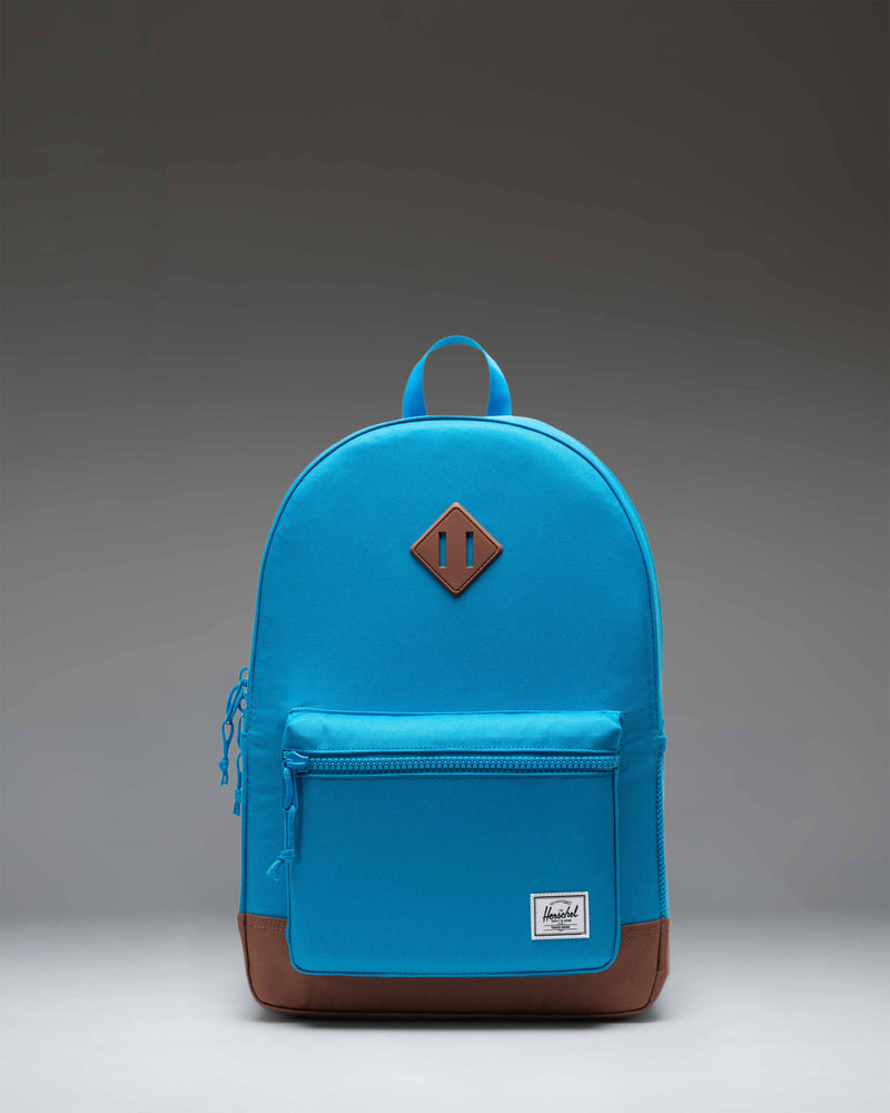 Herschel Heritage Youth Backpack in Hawaiian Surf blue with Saddle Brown diamond accent and straps.