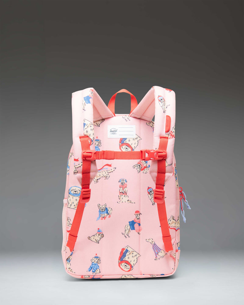 Herschel Heritage Youth Backpack in the Fashion Dogs pattern, featuring an all-over print of various illustrated dog breeds.