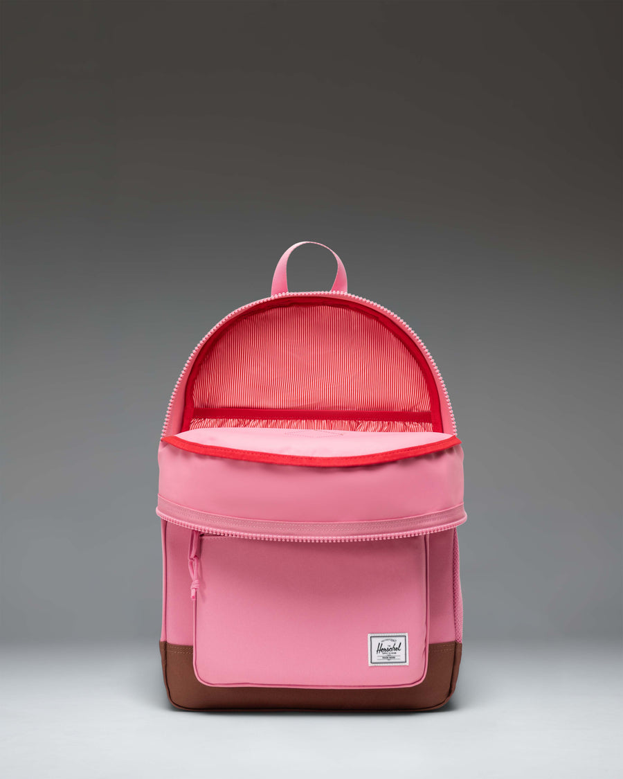 Herschel Heritage Youth Backpack in Cashmere Rose pink with a Saddle Brown diamond accent pocket and rubber diamond detail.