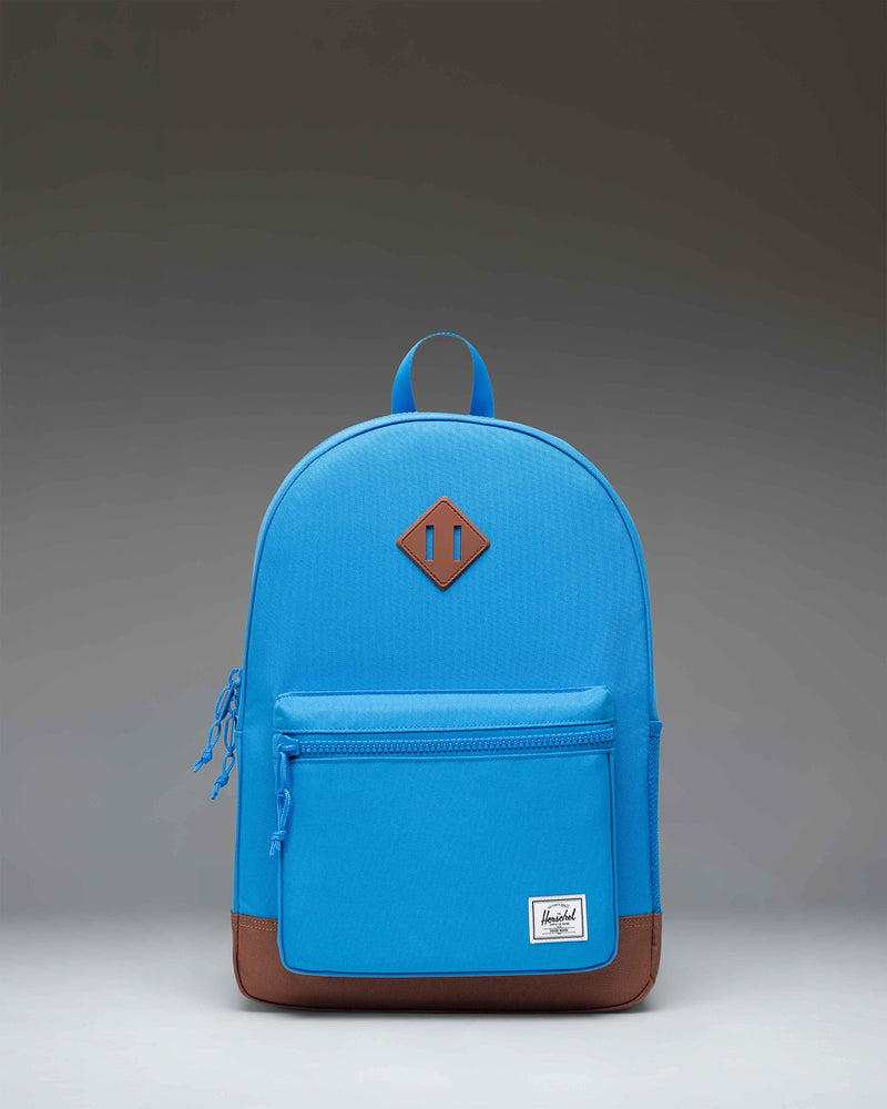 Herschel Heritage Youth Backpack in French Blue with Saddle Brown details, featuring a front storage pocket.