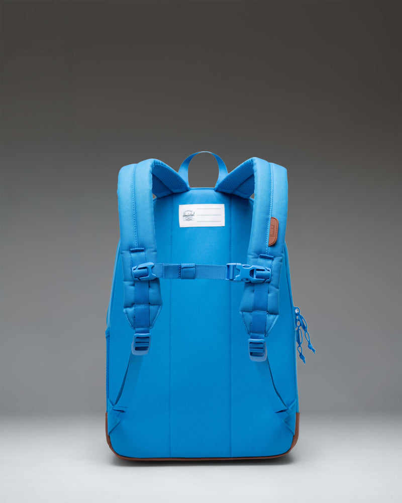 Herschel Heritage Youth Backpack in French Blue with Saddle Brown accents, featuring a classic diamond detail and front pocket.