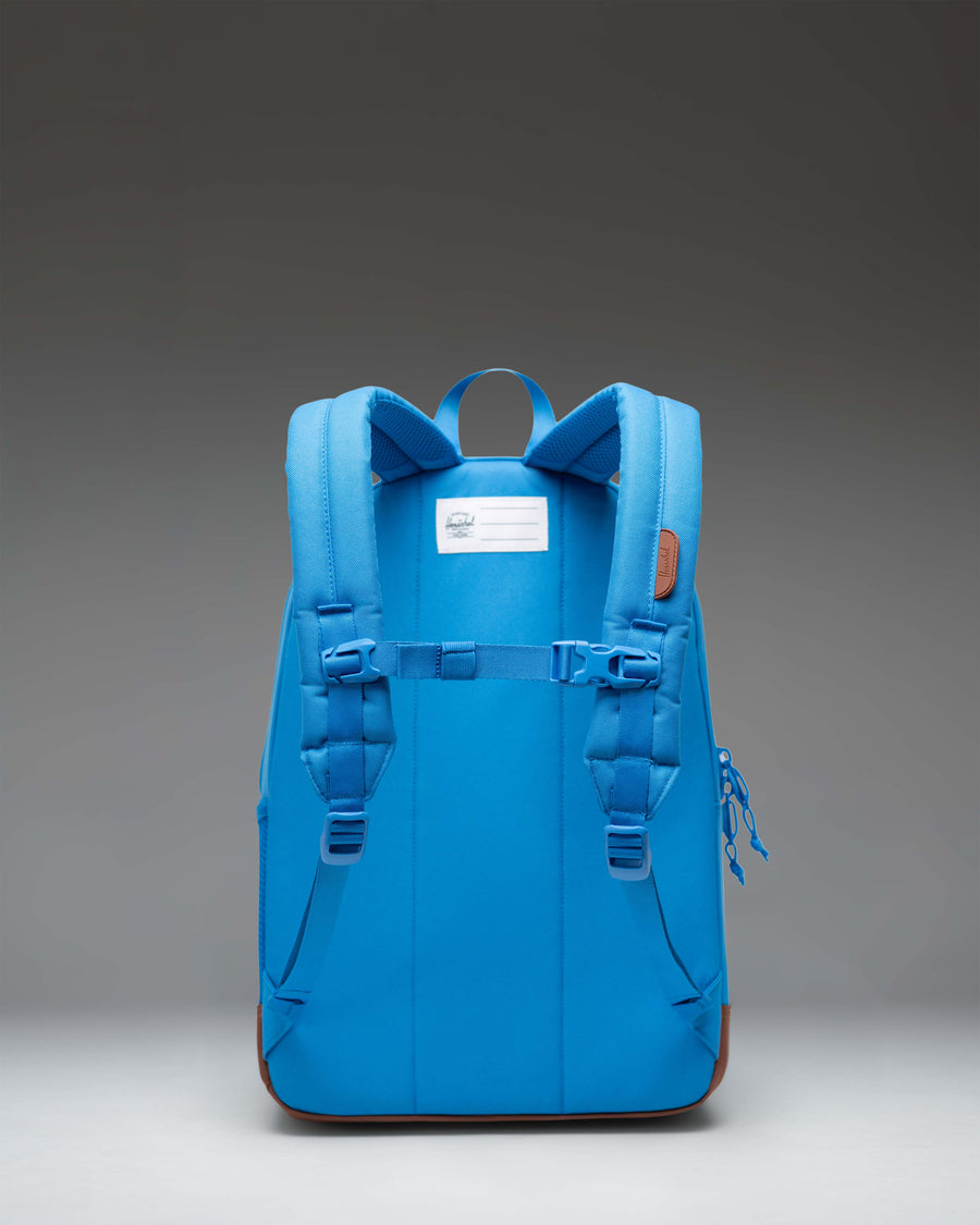 Herschel Heritage Youth Backpack in French Blue with Saddle Brown accents, featuring a classic diamond detail and front pocket.
