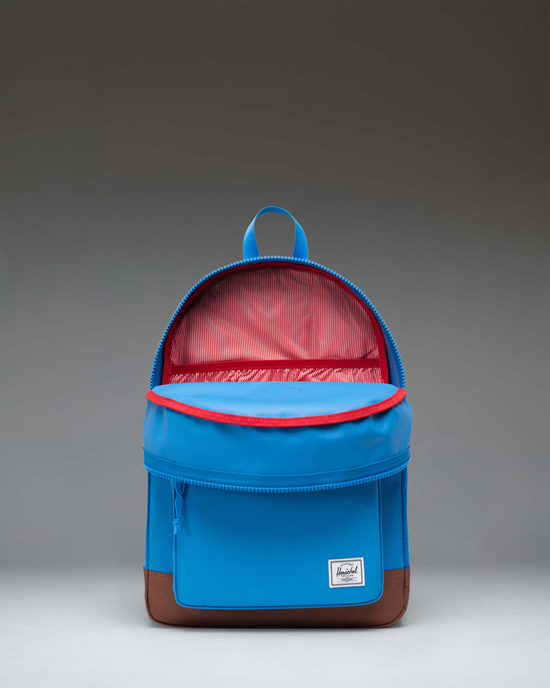 Herschel Heritage Youth Backpack in French Blue with Saddle Brown diamond detail and synthetic leather accents.