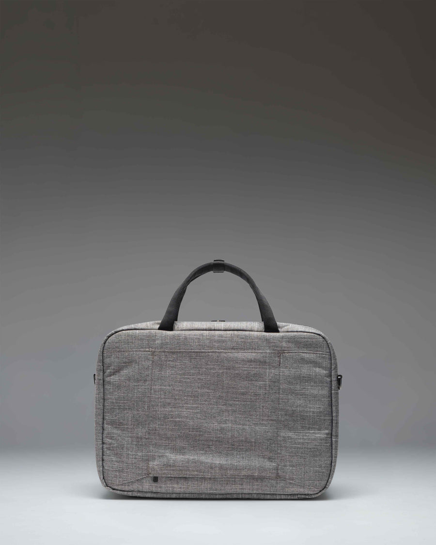 Herschel Supply Co. Gibson Messenger Tech in Raven Crosshatch, a heathered grey laptop commuter bag shown from an alternate angle.