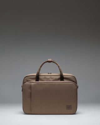 Herschel Supply Co. Gibson Messenger Tech bag in light brown, featuring dual top handles and an adjustable shoulder strap.